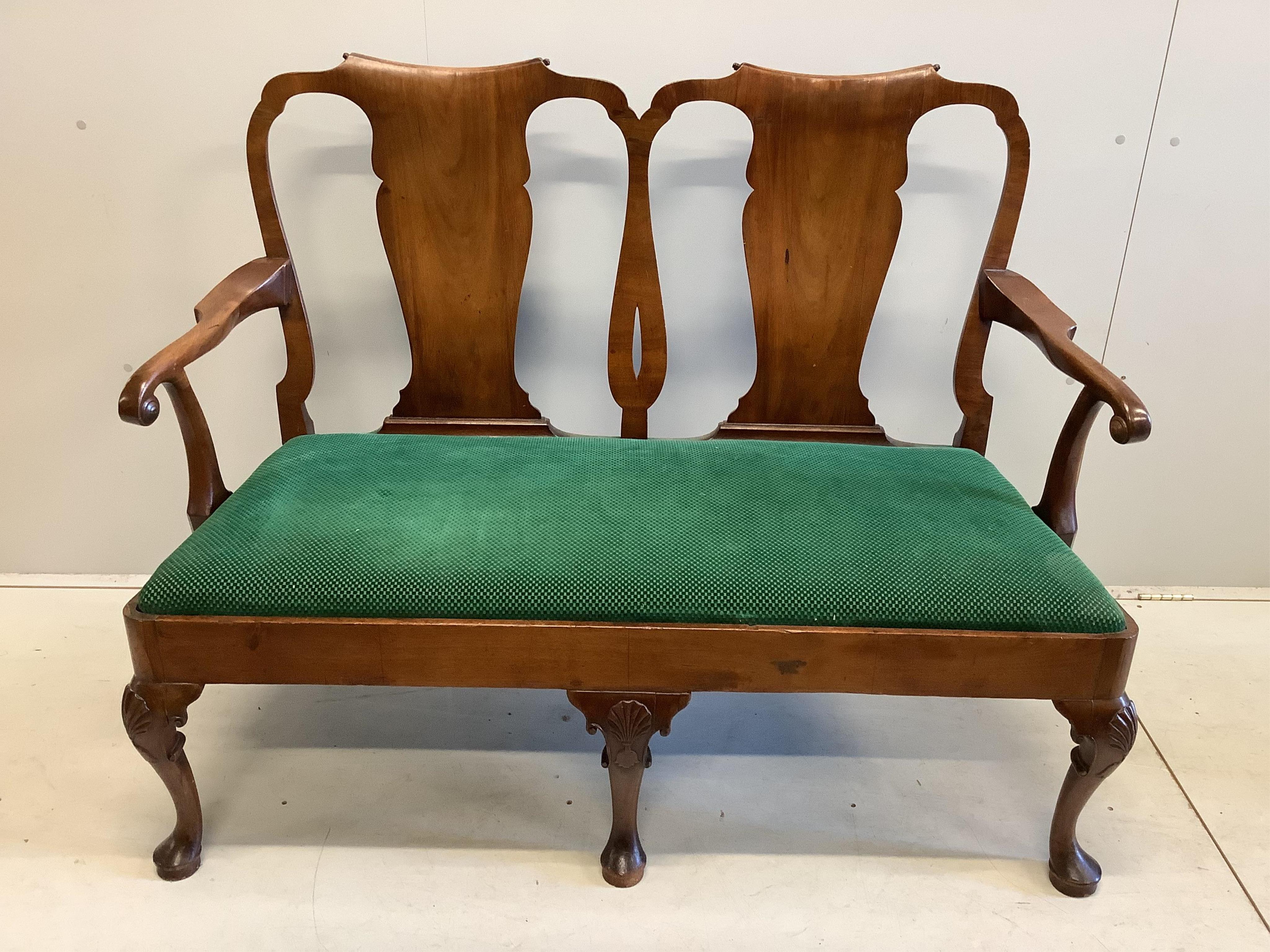 A George I style walnut double chair back settee on shell carved cabriole legs, width 128cm, depth 55cm, height 103cm. Condition - fair